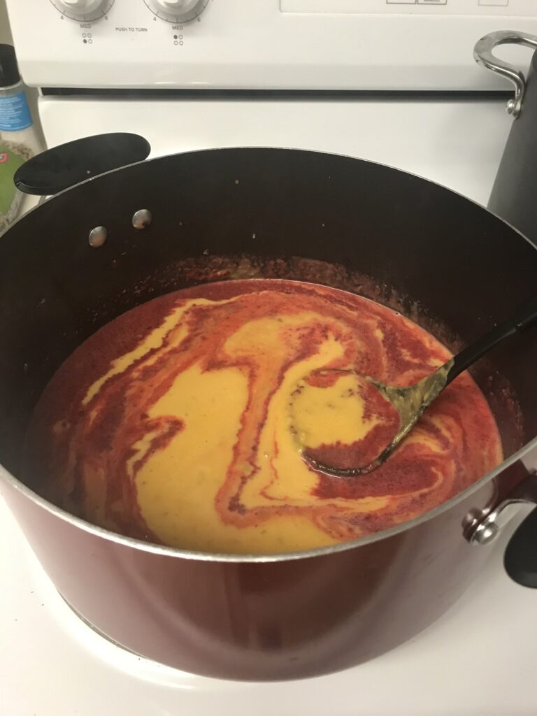 Squash and beet soup swirls