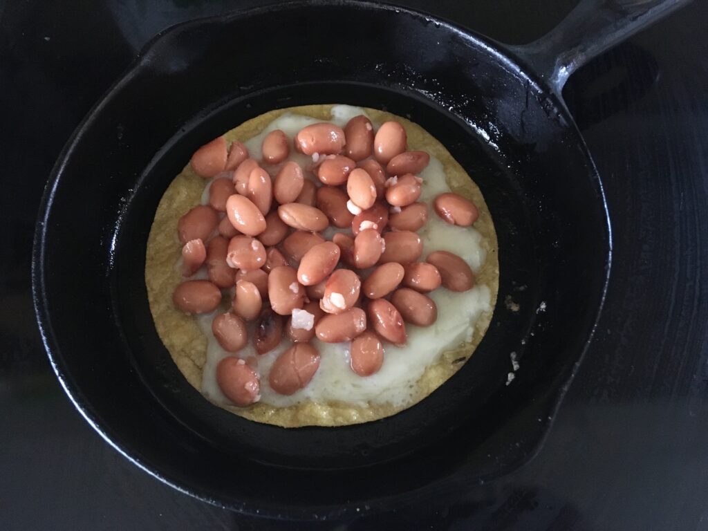 Pinto bean quesadilla in pan