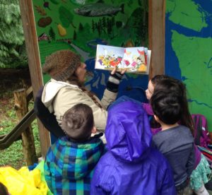 Preschool campers enjoying a story